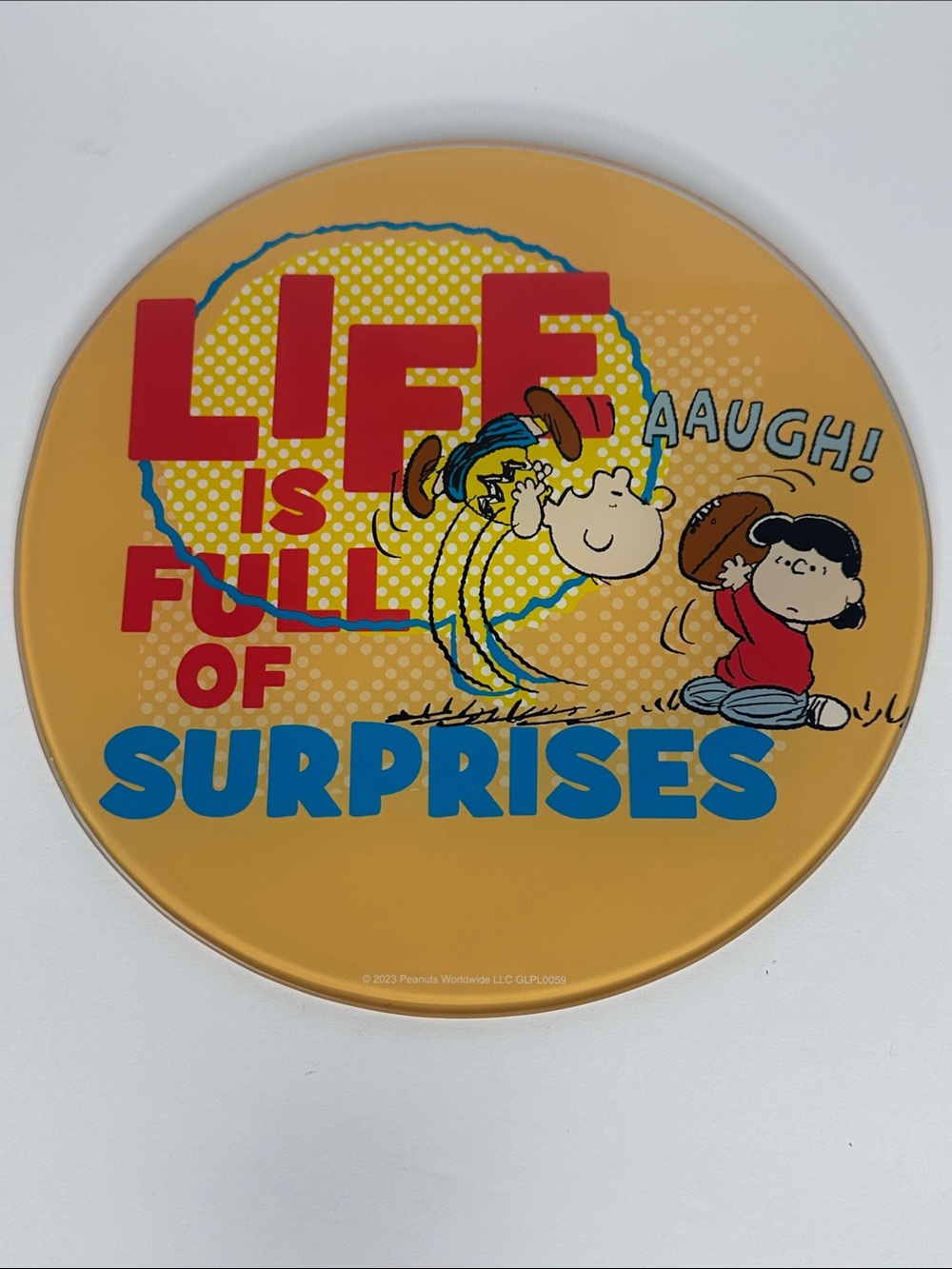 Peanuts Yellow Wall Sign with Red and Blue Lettering